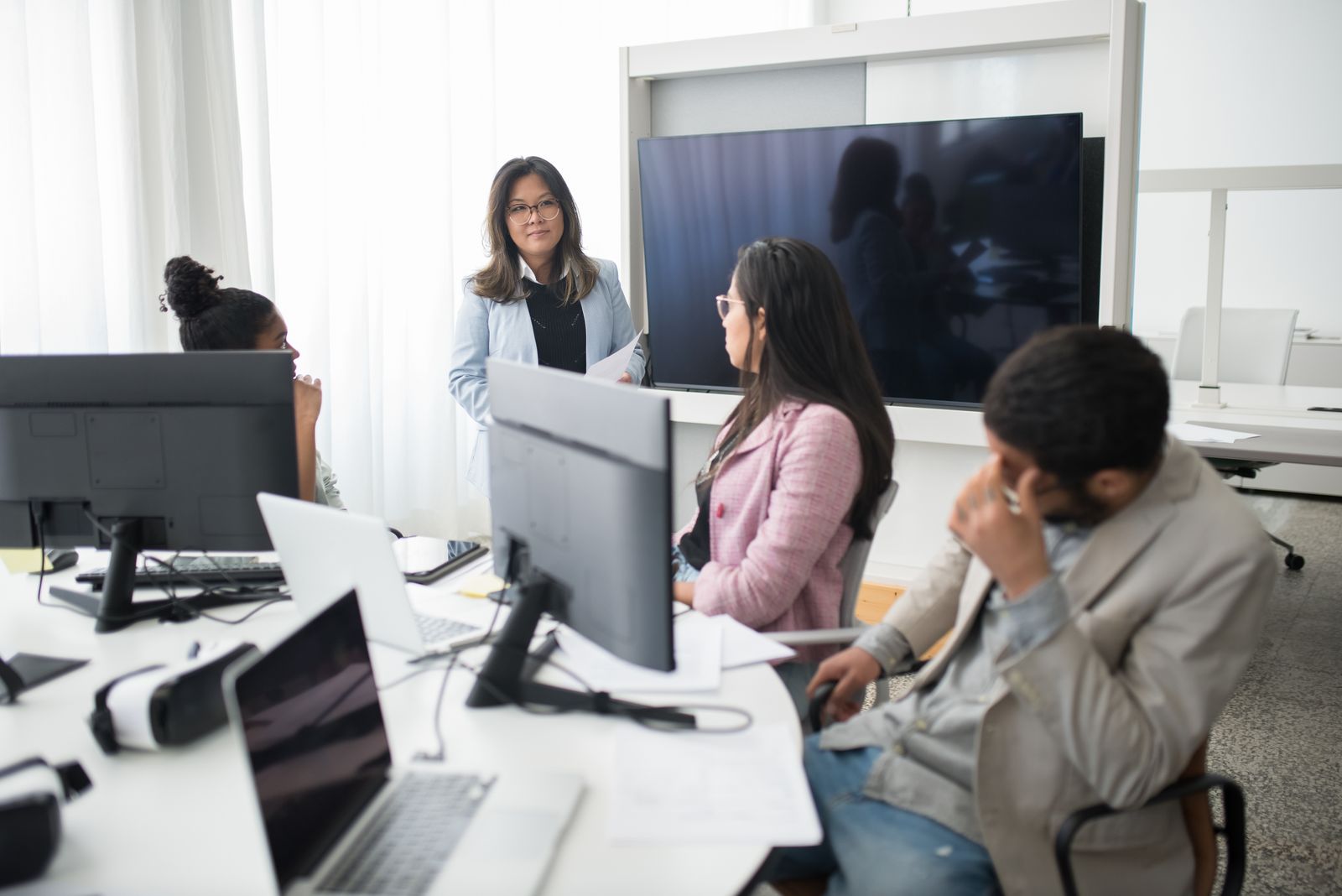 HARA Techno Solutions team collaborating in a modern office